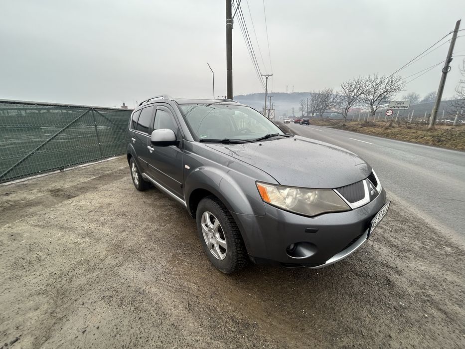 Vând Mitsubishi Outlander II 2.0 TDI (BSY) – 4x4 – 7 LOCURI – 2007