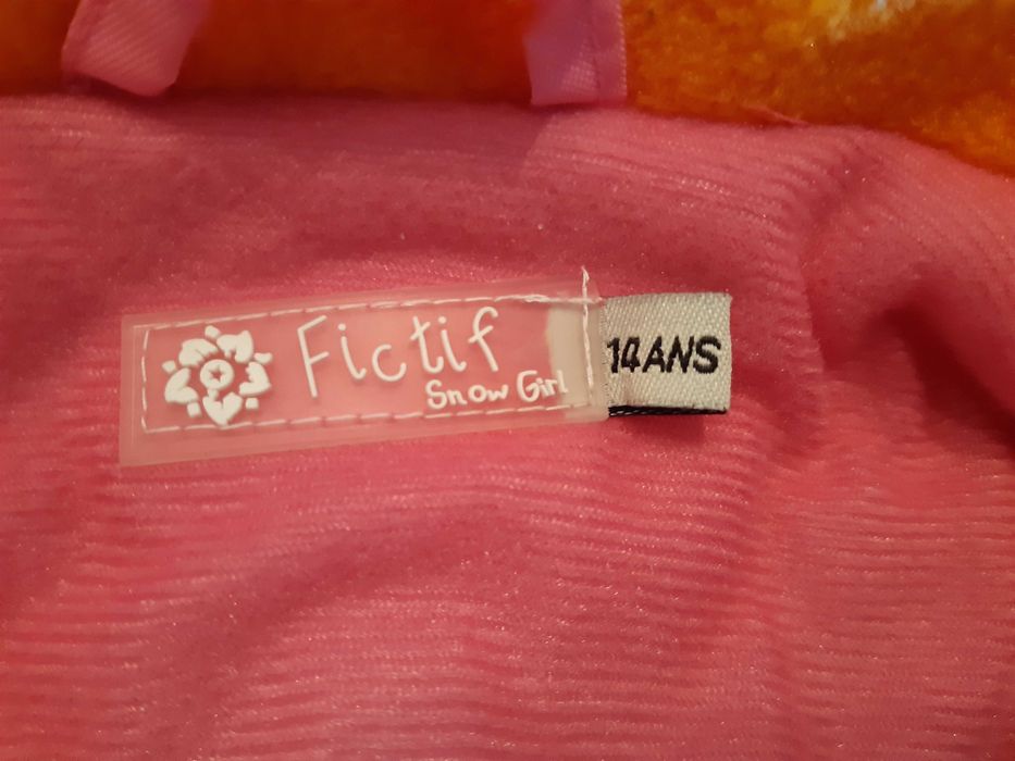 Vand costum de schi culoare roz sidefat.