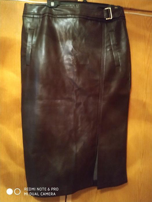 Юбки из кожзаменителя