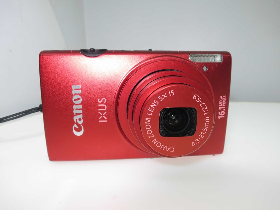 Canon IXUS 125 компактен цифров фотоапара в оранжево червен цвят уникат и отлично състояние като НОВ, работи перфектно