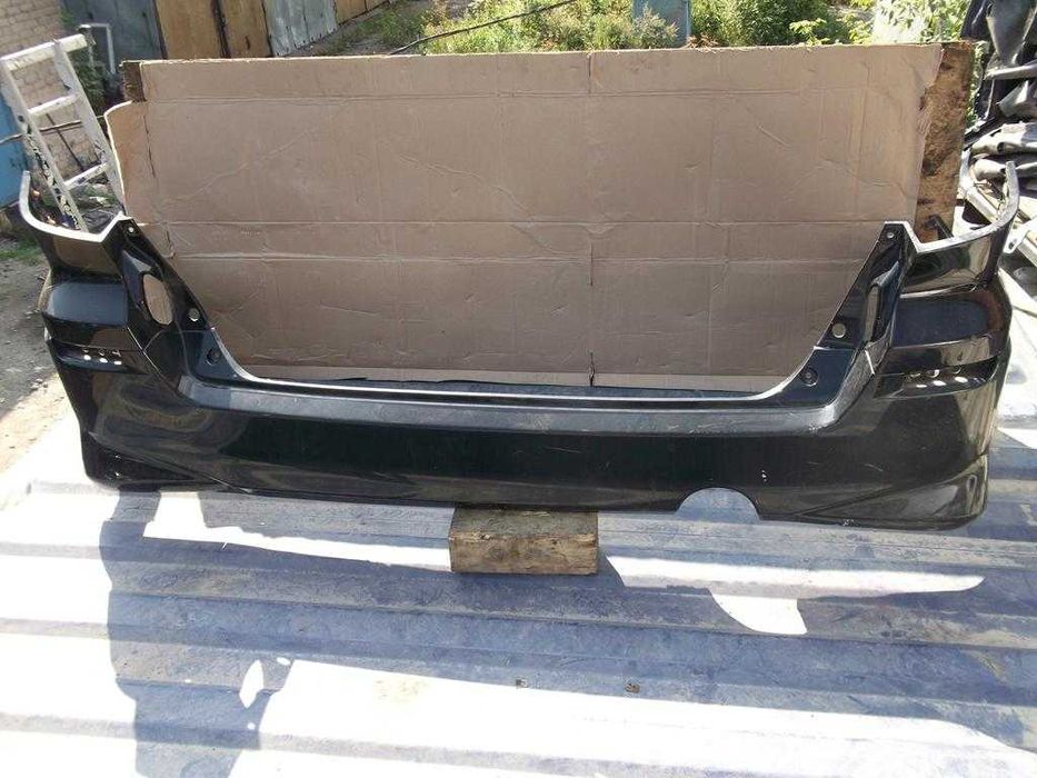 Бампер задний Toyota Alphard I