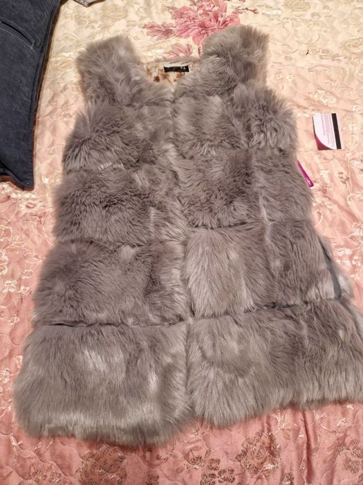Меховая   жилетаа
