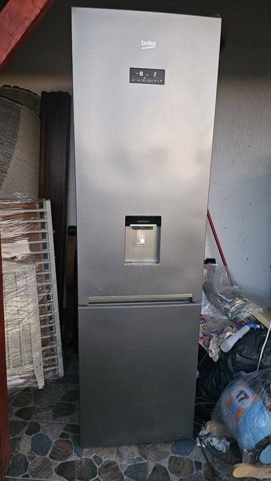 Combina beko cu dozator 1000lei