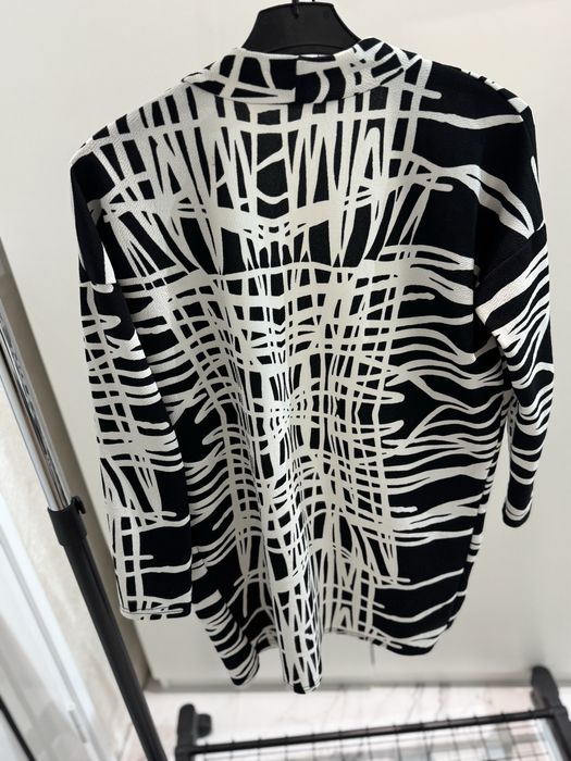 Ефектна връхна дреха