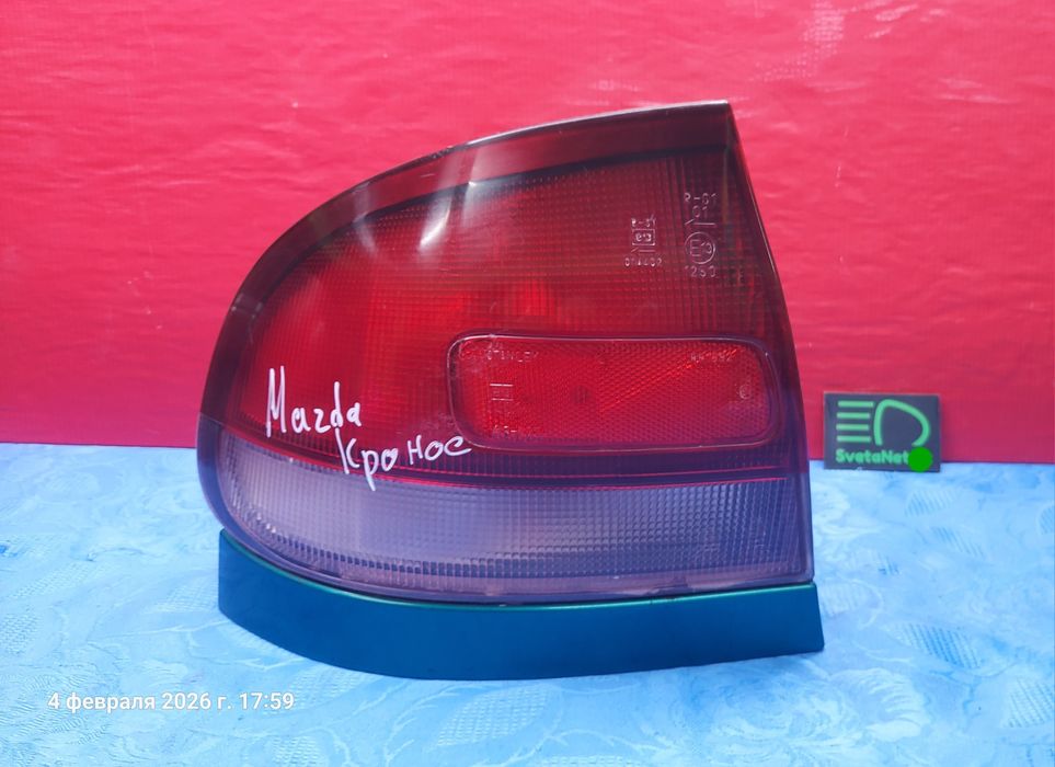 Фонарь задний Мазда Кронос