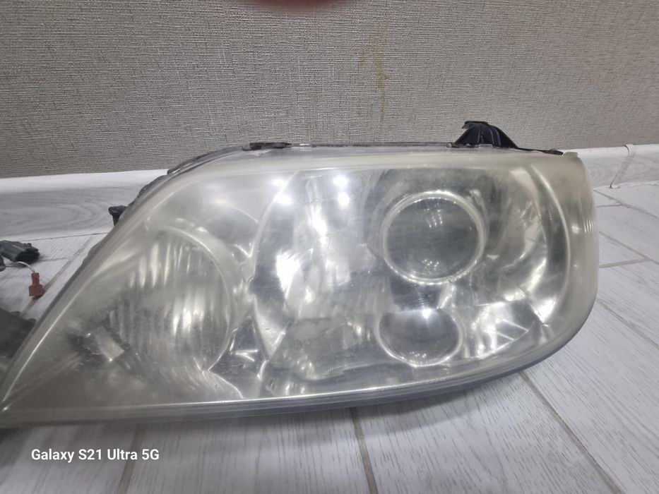 Продам Би Лэд фары Мазда 323 комплект