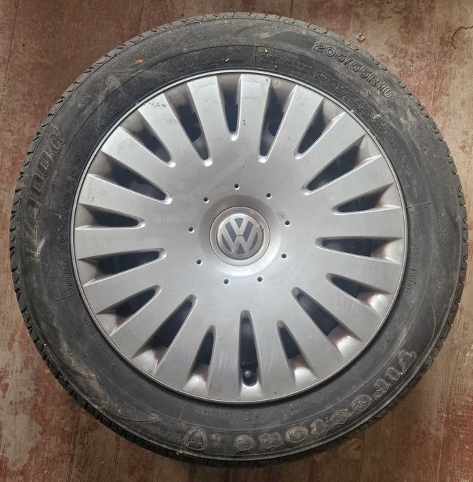 Продавам 8 гуми с джанти и тасове 5×112