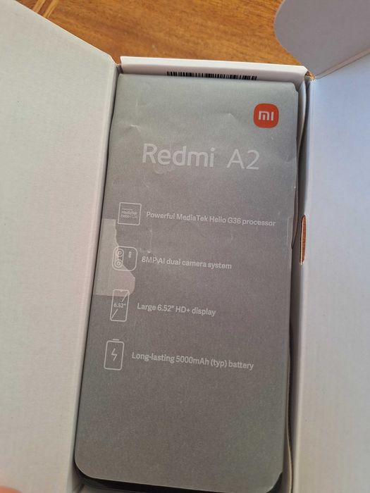 Продавам смартфон REDMI A2 2GB RAM 32GB ROM. С нарушена опаковка,но чисто нов.