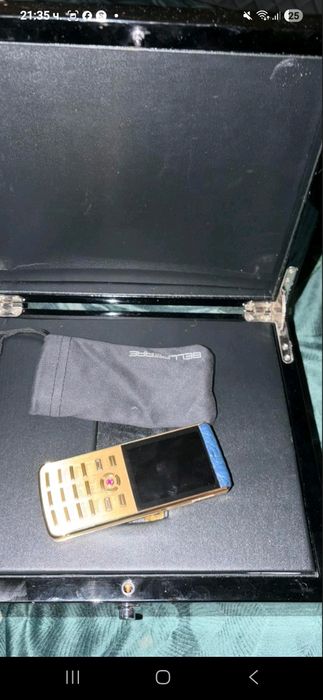 Vertu Signature S – луксозен телефон, злато, сапфир, рубин