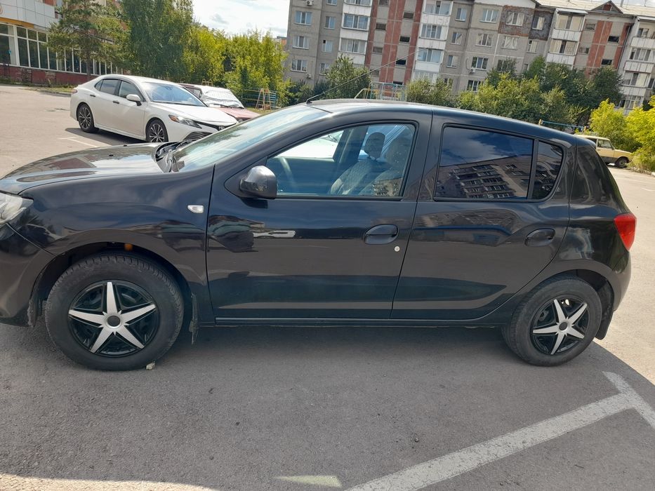 Рено сандеро 2014г