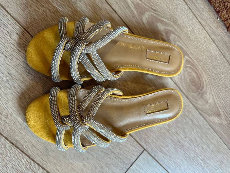 Gucci Amina Muaddi Alexander Wang Louis Vuitton