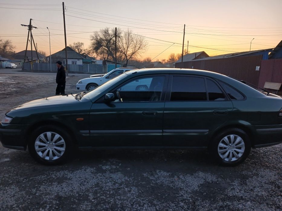 Mazda 626 птичка