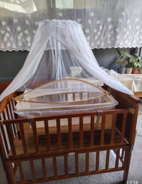 Продам детскую манеж на колесиках