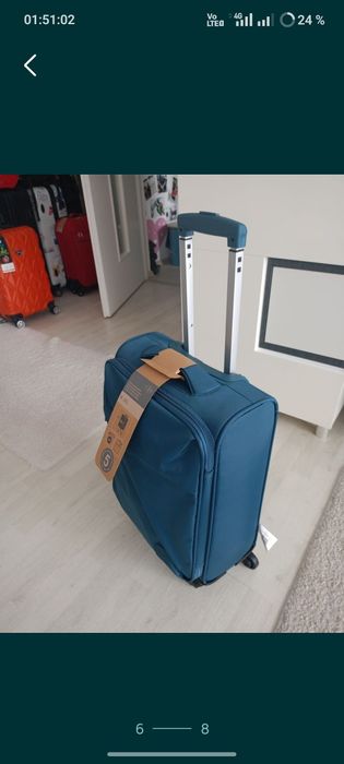 Vând troler material textil,dimensiune de 55 cm,nou, produs calitate.