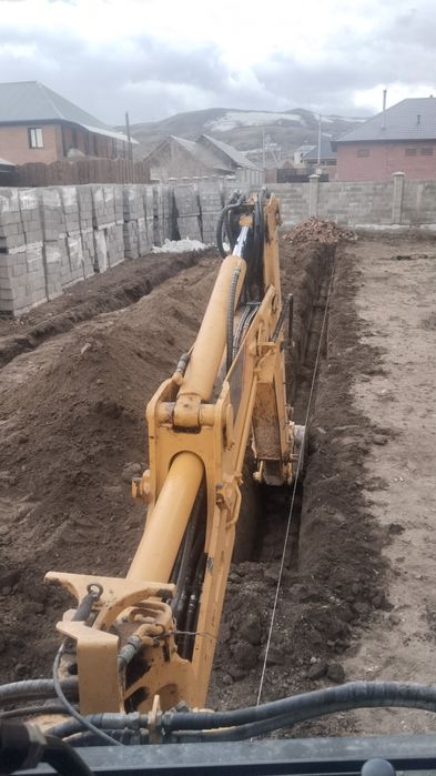 Услуги экскаватора погрузчика