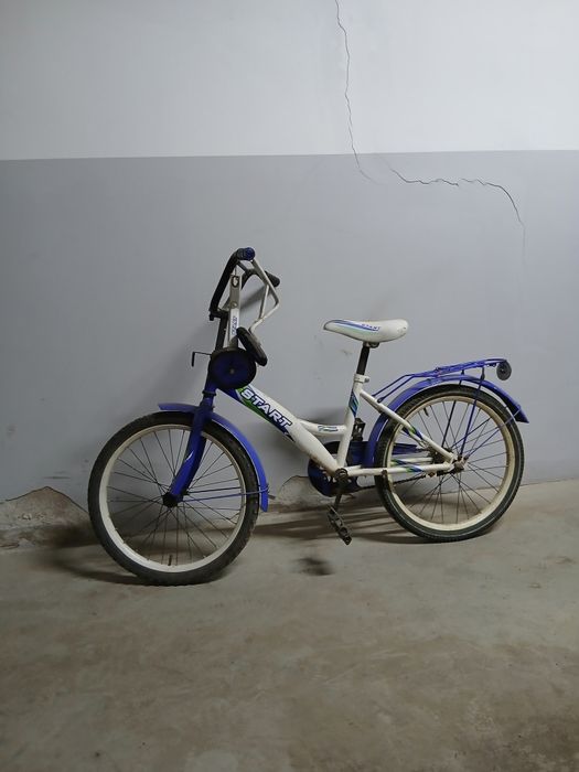 Продам велосипед с дополнительными боковыми колёсами