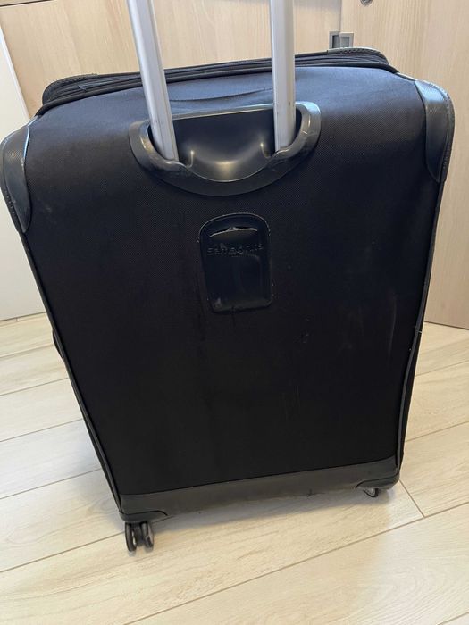Куфар Samsonite, голям, ползван, колелцата работят префектно