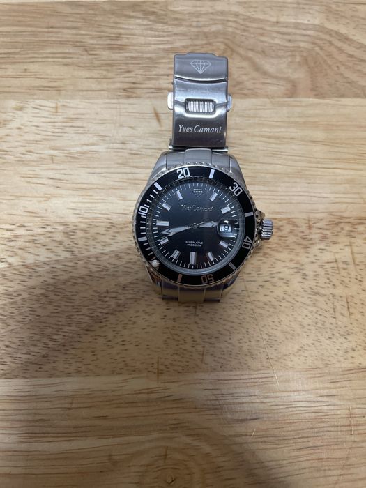 Часы       Yves Camani