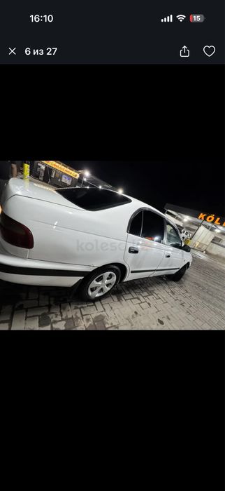 Тайота карина е