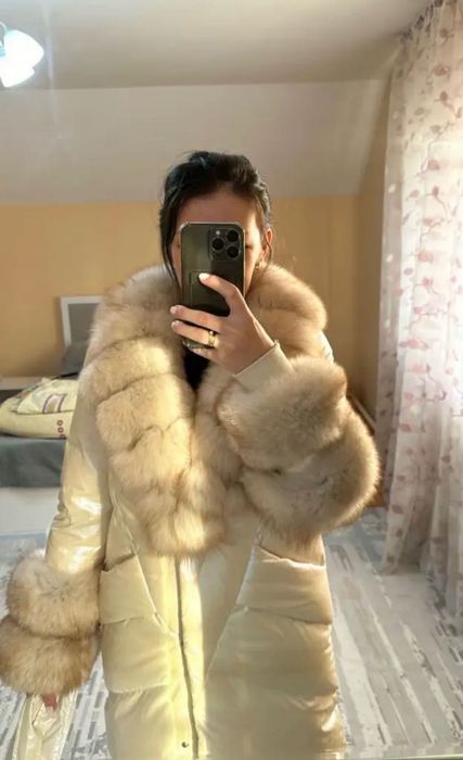Продам пуховик женский