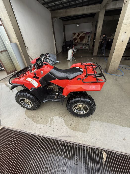 Vând Suzuki king quad