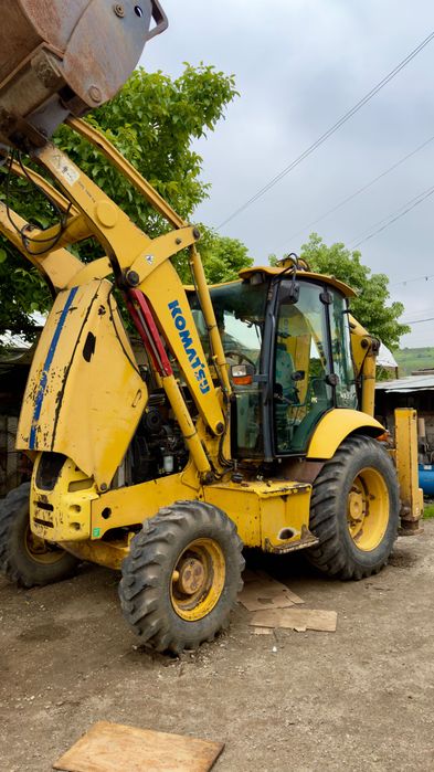 Vând buldoexcavator Komatsu 97