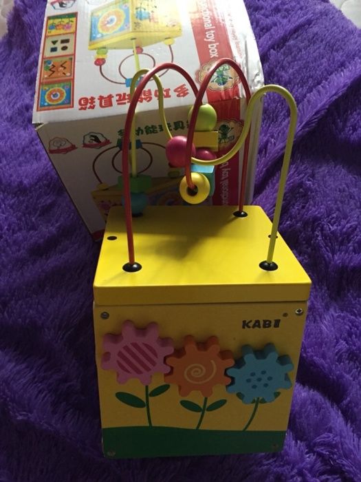 Развивающая игрушка из дерева