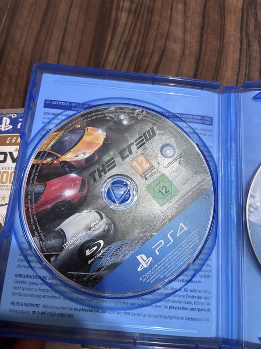 Playstation 4 + 4 controlere si 9 jocuri