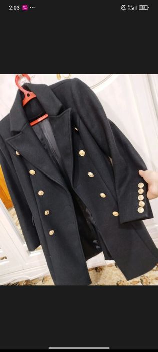 Женский палто ..