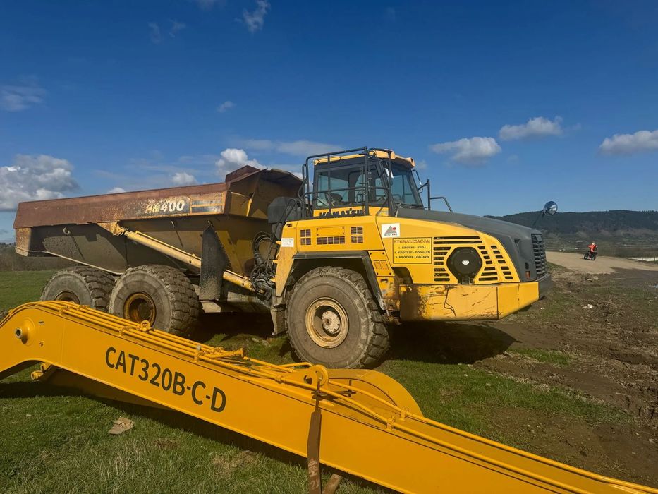 Komatsu HN 400  Dumper 6X6 22 mc, benă încălzită