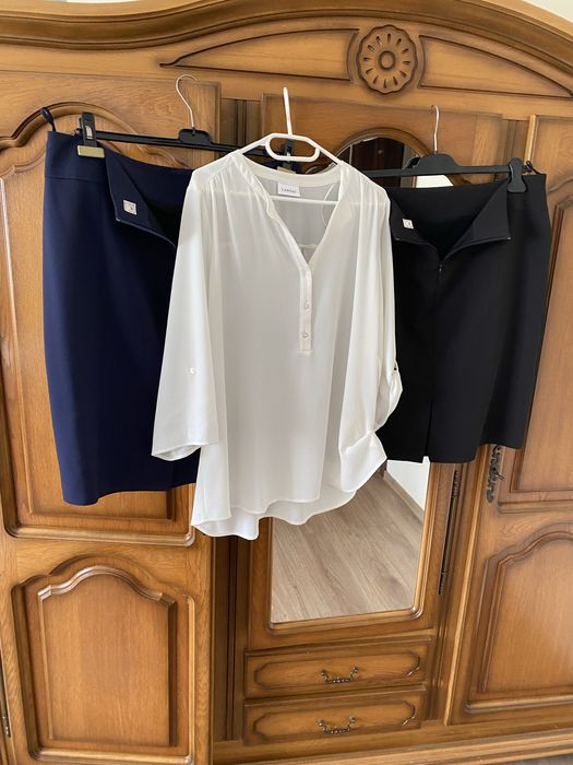 Set de 2 fuste conice si bluza eleganta cu dimensiuni afisate