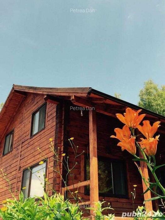 Casa din lemn masiv cu teren in Muntele Rece