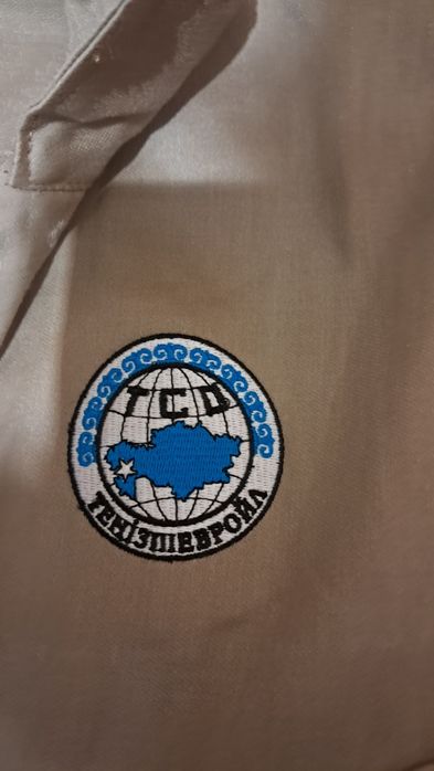 Продам новый фирменный комбинезон!