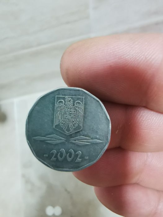 Vand monedă 5000 lei