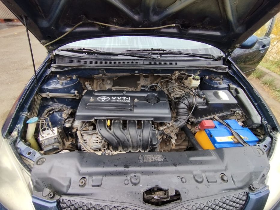 Тойота  Королла  Е120