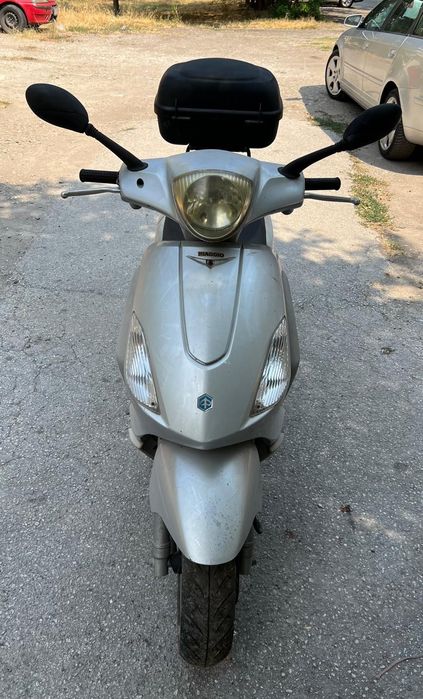 Мотопед Piaggio 125 cc