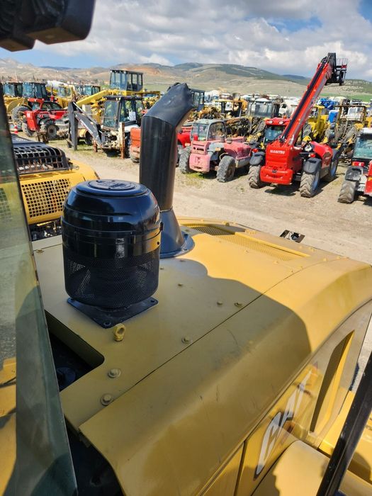 Фронтальные погрузчики Caterpillar 950GC