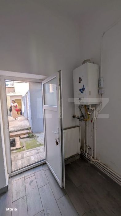 Casa cu 2 camere si mansarda ,plus bucatarie de vara .