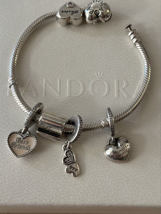 Гривни и Талисмани Pandora