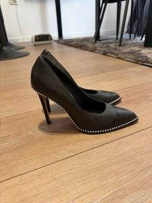 Обувки на висок ток