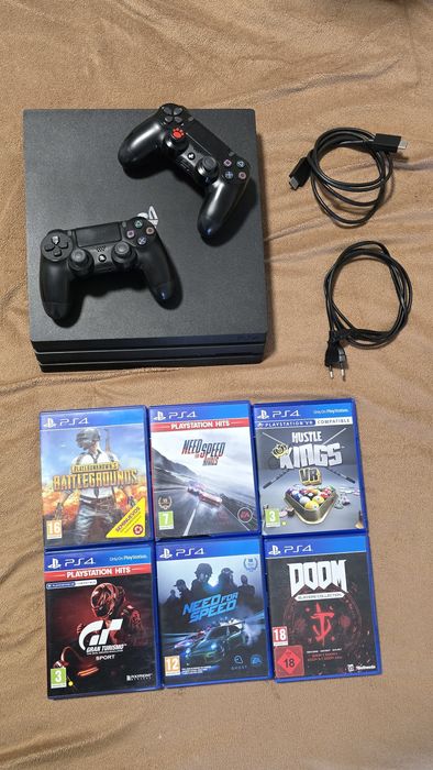 PS4 Pro + 2 controllere + 6 jocuri