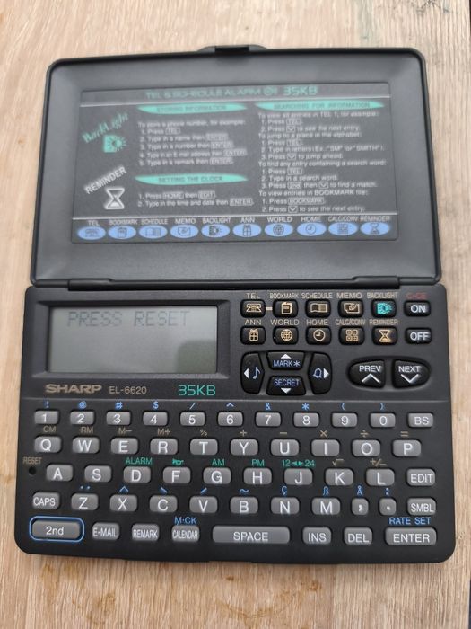 Agenda telefonică,calculator sharp