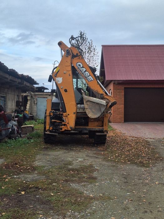 Услуги экскаватора погрузчика