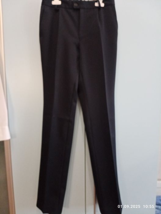 Школьные брюки б/у для мальчика 42/170