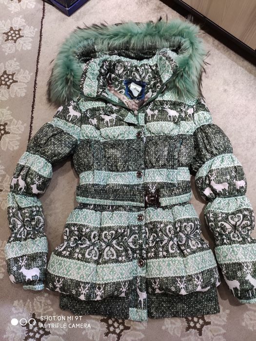 Продам пуховик женский