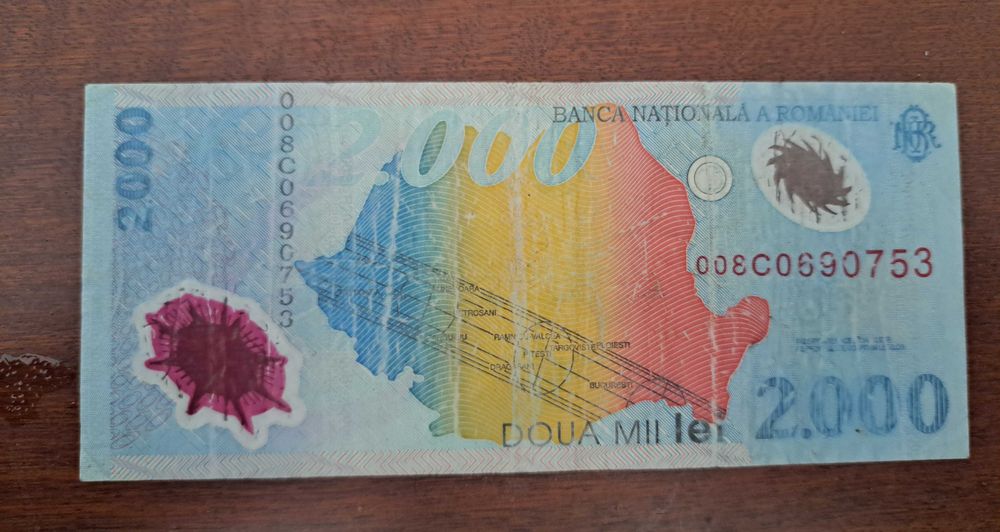 Bancnota 2000 lei eclipsa 1999!