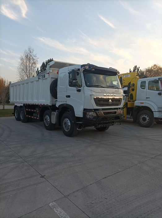 Самосвал HOWO-T7S 8x4 - 32 т / 26 куб.м Sunhunk