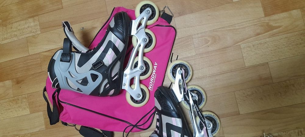 Роликовые коньки