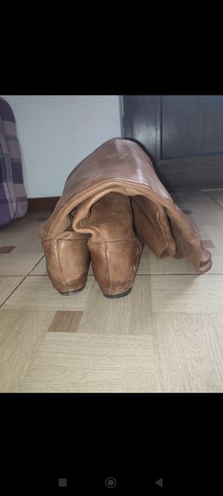 Cizmele lungi din piele