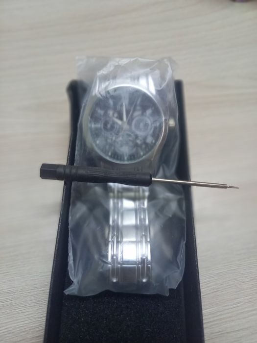 Серебряные золотые часы